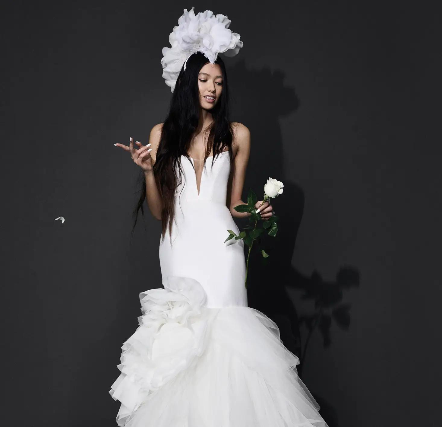 Model wearing a white gown by Vera Wang